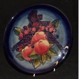 A 20th Century Moorcroft "Blue Finches" pattern plate, designed by Sally Tuffin,