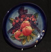 A 20th Century Moorcroft "Blue Finches" pattern plate, designed by Sally Tuffin,