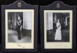 OFFICIAL PHOTOGRAPHS OF QUEEN ELIZABETH II AND PRINCE PHILIP, portrait studies, a pair,