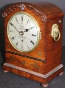 A circa 1835 flamed mahogany brass inlaid bracket alarm clock, the dial marked "Walsh, Market Place,