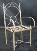 An early 19th Century wrought iron garden chair,