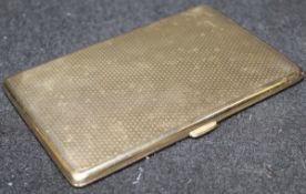 A 9 carat gold cigarette case with engine turned decoration to front and back,