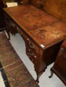 An early 20th Century mahogany writing table,