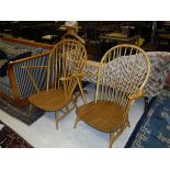 A pair of modern Ercol light elm and beech elbow chairs CONDITION REPORTS No