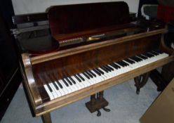 An early 20th Century rosewood cased baby grand piano in the Art Nouveau style,