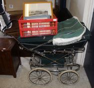 A Silver Cross pram in British racing green, together with a collection of assorted pictures,