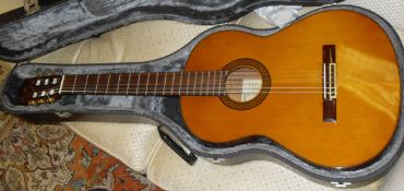 A Yamaha G-230 classical guitar