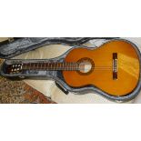 A Yamaha G-230 classical guitar