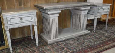 A modern silver grey painted console table in the classical style on column supports,