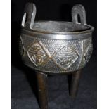 A Chinese bronze censer with two rectangular loop handles to the rim,