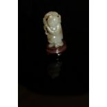 A Chinese carved jade figure of Caishen on a carved hardwood base CONDITION REPORTS