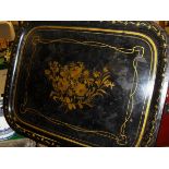 A late 18th / early 19th Century toleware tray decorated with a golden laurel spray on a black