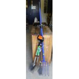 A modern border fork and spade, a long handled manure fork,