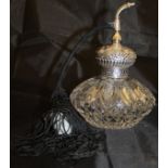 A late Victorian silver mounted and cut glass scent bottle,