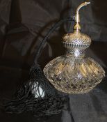 A late Victorian silver mounted and cut glass scent bottle,
