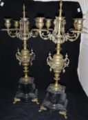A pair of 19th Century brass four branch candelabra,