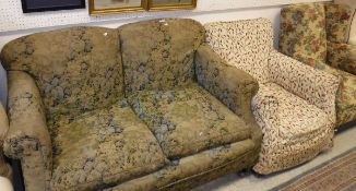 A circa 1900 upholstered two seat scroll arm sofa,