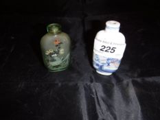 A 19th Century Japanese porcelain scent bottle depicting woman in traditional dress carrying two