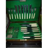 An oak cased canteen of plated cutlery and four boxes of sundries to include treen ware,
