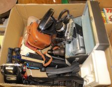 A box containing various cameras including Sankyo Super CM800, a Keystone Twenty 8mm Zeiss Ikon,