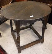 A 19th Century circular oak table,
