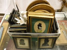 A box containing various 19th Century silhouette portraits,