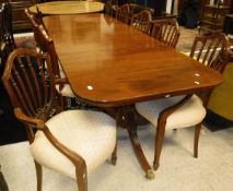 A reproduction Regency style mahogany D-end extending dining table,