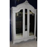 A French grey painted armoire with two cupboard doors in the Louis XV style CONDITION