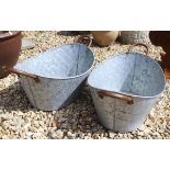 Two oval metal planters*