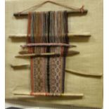 A Tibetan tribal woolwork hanging arrangement,