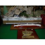 A scale model of a four masted ship,