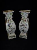 A pair of circa 1900 Meiji period Japanese satsuma ware vases of square baluster form decorated