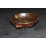 A dark oak adzed fruit bowl by Robert Thompson of Kilburn (The Mouseman) with typical mouse motif,