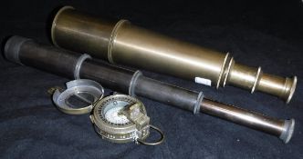 A modern brass compass in the World War II manner,
