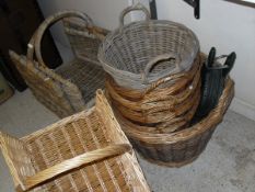 A collection of nine various log and other baskets and a pair of bellows