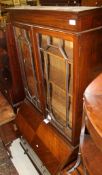 An early 20th Century mahogany bureau bookcase with inlaid decoration,