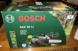 A Bosch AKE 30LI cordless chain saw
