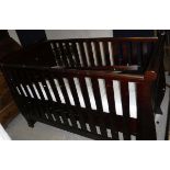 A modern Silver Cross "Dorchester" mahogany framed cot and mattress,