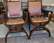 A pair of Edwardian Sheraton Revival mahogany and satinwood banded X framed salon chairs with