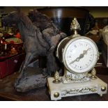 A circa 1900 French drum mantle clock on a white alabaster and brass embellished base,