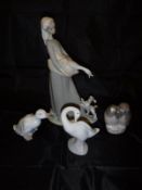 A Lladro figure of a girl with goose and spaniel, Lladro figure of goose,