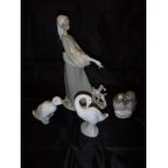 A Lladro figure of a girl with goose and spaniel, Lladro figure of goose,