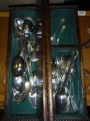Three boxes of assorted plated cutlery,
