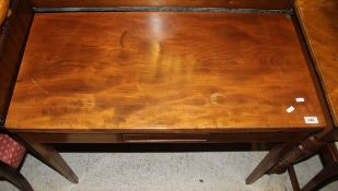 An early 20th Century mahogany and inlaid fold-over tea table,