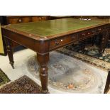 A mahogany library table in the Victorian manner,