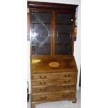 A Regency mahogany and rosewood cross-banded bureau bookcase,