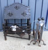 A cast iron fire basket with fire back depicting three Fleur de Lys and a pair of cast iron fire