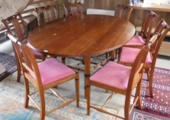 A modern mahogany dining suite by Freeborn of York,