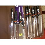 A Goldfish nine piece knife set in case and a Goldfish nine piece knife set in roll*