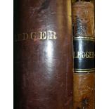 A brown leather bound accounts ledger for a butcher's shop,